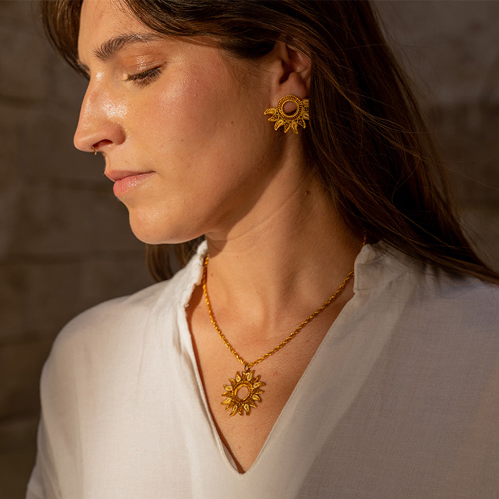 Model wearing the OH Voila Sunflower Pendant and Earrings in Gold