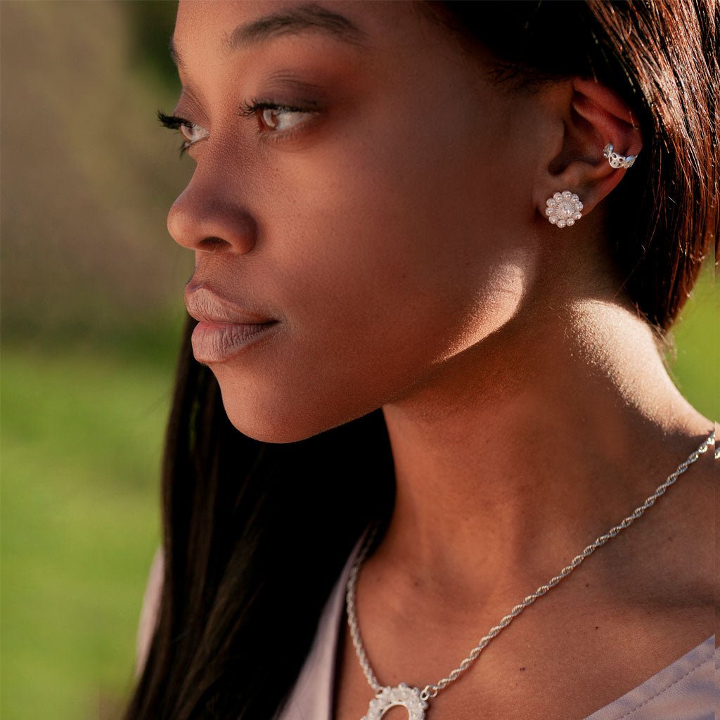 Model wearing the CORAL STUDS - OH VOILA JEWELRY