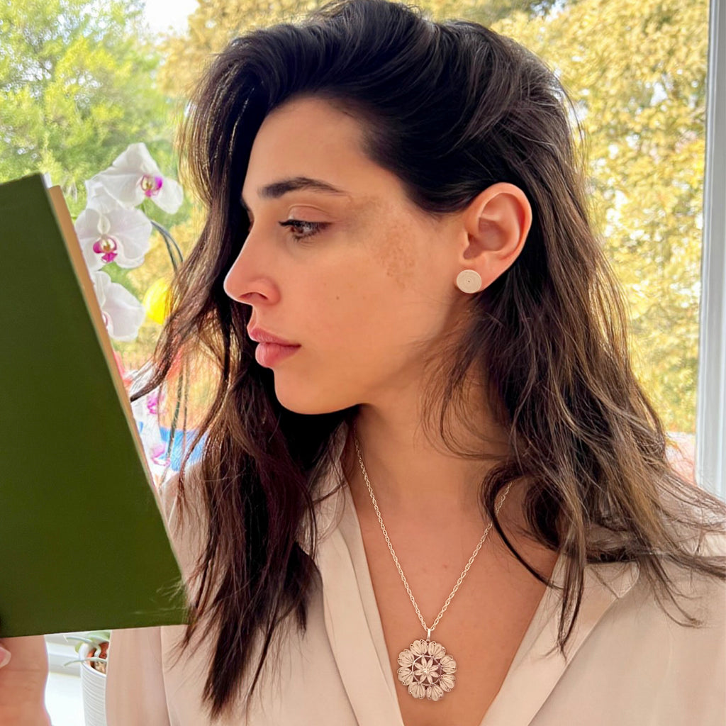 Model wearing OH VOILA Daisy Mandala Necklace Silver and Cosmos Silver Earring
