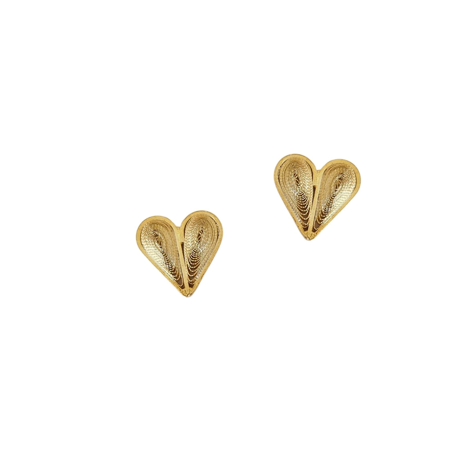 Gold heart-shaped earrings on a white background