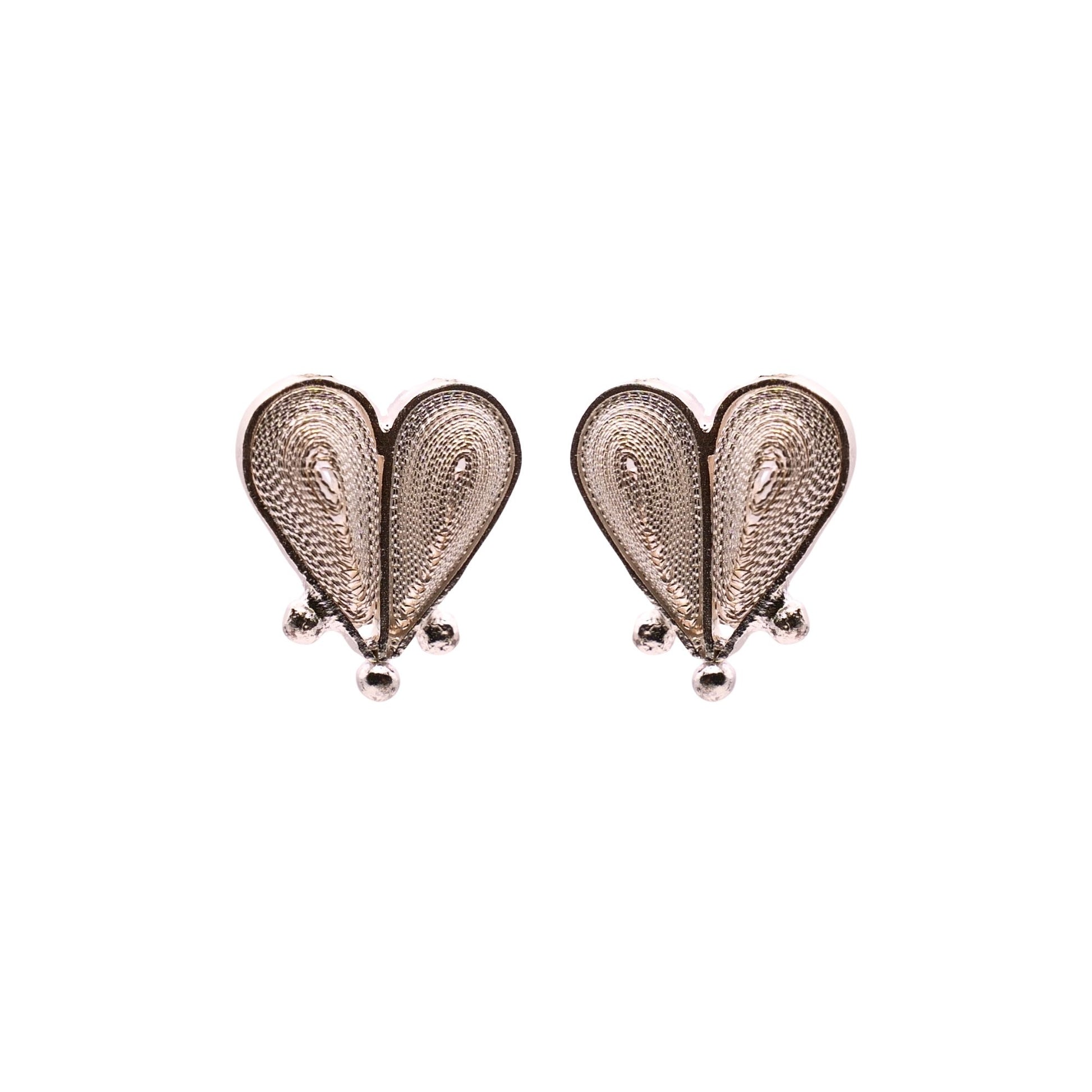 Heart-shaped earrings on a white background